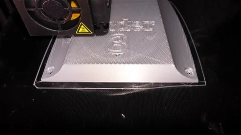 3D Printing Detail - Silver 3D Printing Piece Stock Footage 99659475