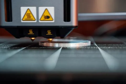 The 3D printing machine make the 3D prototype model by resin material. Stock Photos