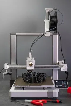 The 3D printing machine operation. The 3D rapid prototype processing concept. Stock Photos