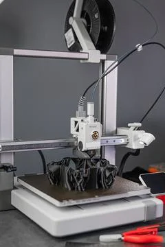 The 3D printing machine operation. The 3D rapid prototype processing concept. Stock Photos