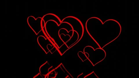 3D red glossy outlines in the form of a heart symbol rotates on a black backgrou Stock Footage 310507733