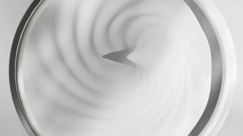 3d render animation motion design of cream texture spinning around white grey co Stock Footage 279774745