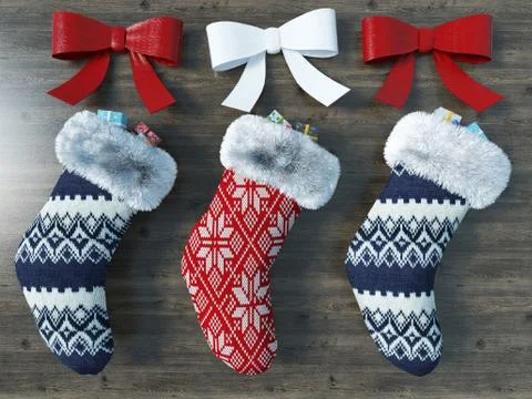 3D render of a beautiful red and blue Christmas socks with ribbons Stock Illustration