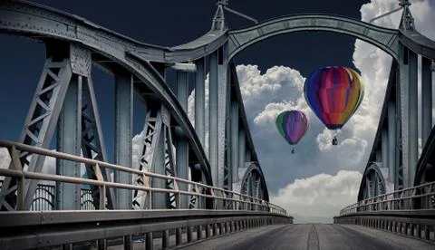A 3D render of a bridge with hot air balloons and clouds in the sky in the ba Illustrazione stock