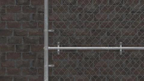 3D Render of Chain link fence on a brick wall Stock Illustration