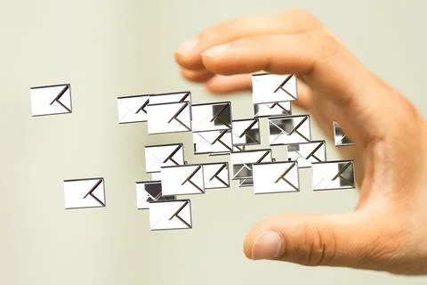 3D render of chrome express envelopes near a hand イラスト素材