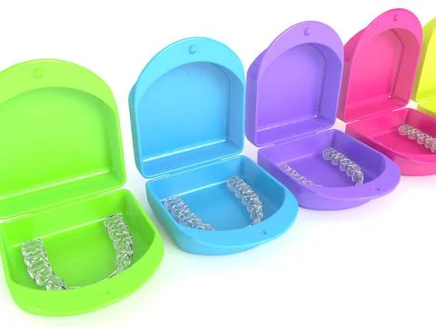 3d render of clear and removable aligners with cases over white background Illustrazione stock