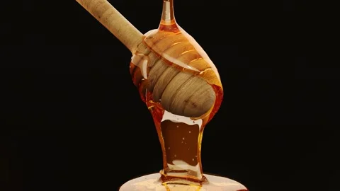 3d render of a close up honey flowing from wooden dipper Stock Footage 134153677