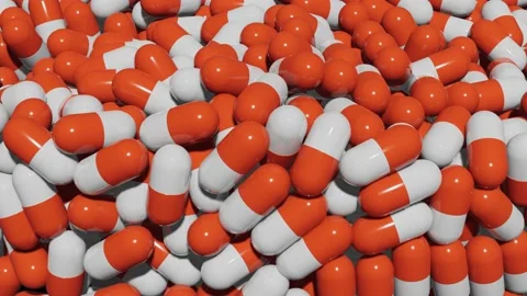 3D render close up red and white pills moves on conveyor. Pharmacy factory Stock Footage 168608331