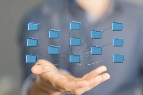 3D render of cloud storage in folder icons being manipulated by a person in a ho Foto stock
