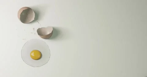 3d render cracked raw dropping egg for nutritious or breakfast Stock Footage 259143614