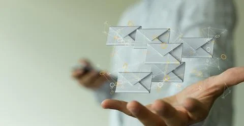 3D render of an email symbol and Network Communications with male hands on a blu Stock Photos
