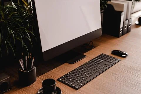 3D render of empty modern office with computers and furniture Stock Photos