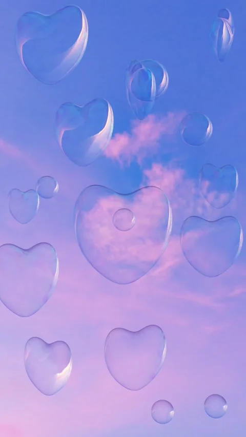3D render of floating heart shaped soap bubbles on a pink purple sunset backgrou Stock Footage 225640094