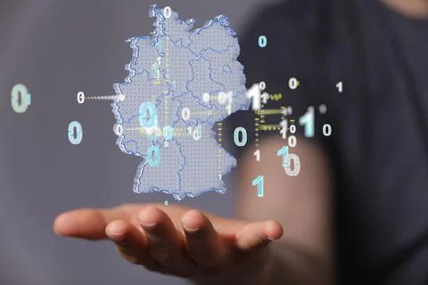 3d render of a German map with binary codes floating over a hand 스톡 사진