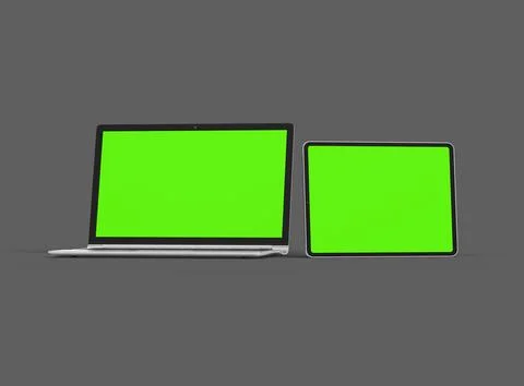 3d render of laptop and tablet with green screen on a dark background Stock Illustration