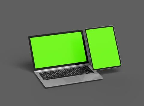 3d render of laptop and tablet with green screen on a dark background Stock Illustration