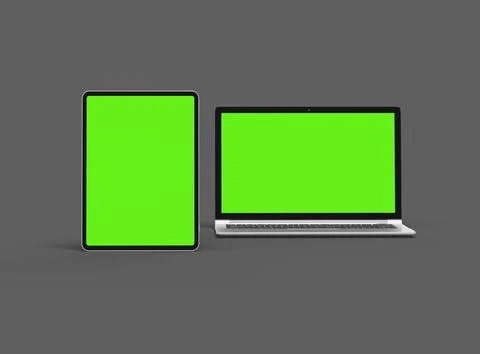 3d render of laptop and tablet with green screen on a dark background Illustrazione stock