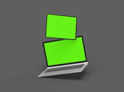 3d render of laptop and tablet with green screen on a dark background Stock Illustration