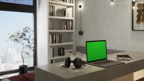 3d render. The laptop is lying on a table with a green screen Stock Footage 254799535