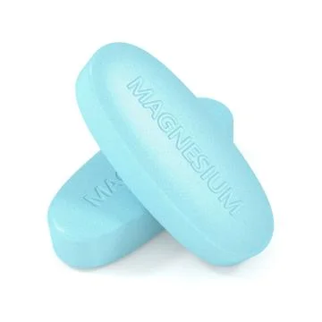 3d render of magnesium pills over white Illustrazione stock