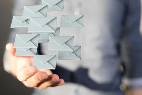 3D render of the "Message" icon being manipulated by a person in a holographic m Stock Photos