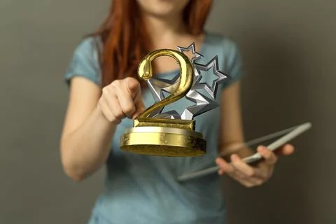 3D render of the number 2 on a trophy being manipulated by a person in a hologra 스톡 사진