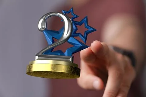 3D render of the number 2 on a trophy being manipulated by a person in a hologra 스톡 사진