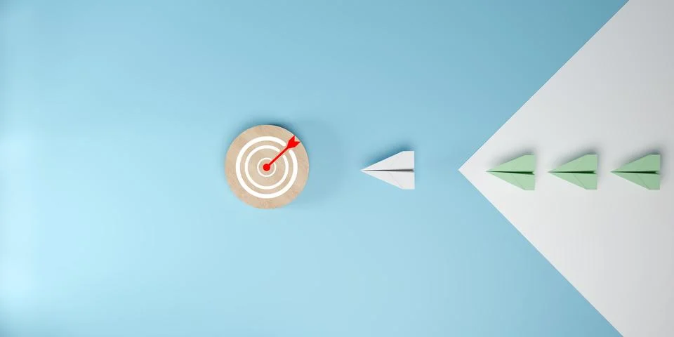 3D render of paper planes flying in arrow shape toward a wooden target with.. Stock Photos