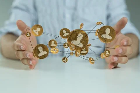 3d render of people icons - network in hand 写真素材