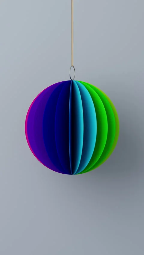 3D render of a rainbow colored Christmas paper ball on light grey background, Stock Footage 320228773