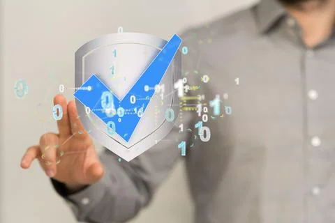 3D render of a shield with a check and surrounded by binary codes in a holograph Stock Photos