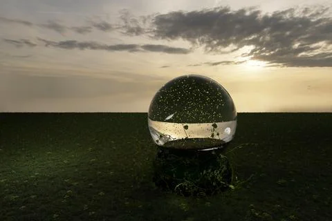 3d render of snow globe at sunset in grassy meadow Stock Illustration