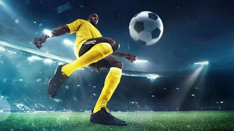 3D render of stadium. Focused and skillful man, soccer player in yellow uniform 스톡 사진