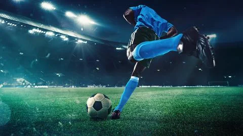 3D render of stadium. Focused and skillful man, soccer player in blue uniform 写真素材