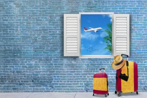 A 3D render of suitcases painted in Spanish flag colors with a summer hat and Stock Illustration