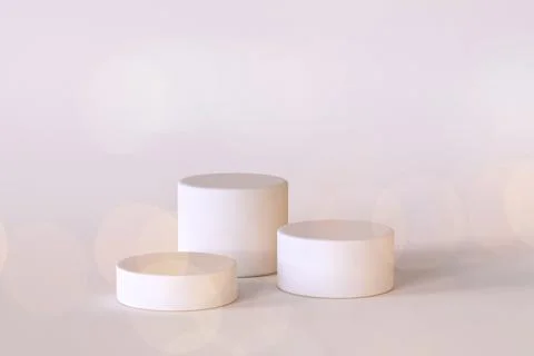 3d render of three white podiums. Minimalistic scene for cosmetics or product Stock Illustration