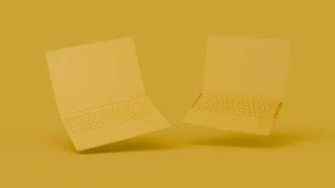 3D render of two laptops floating against a monochrome yellow background 스톡 사진