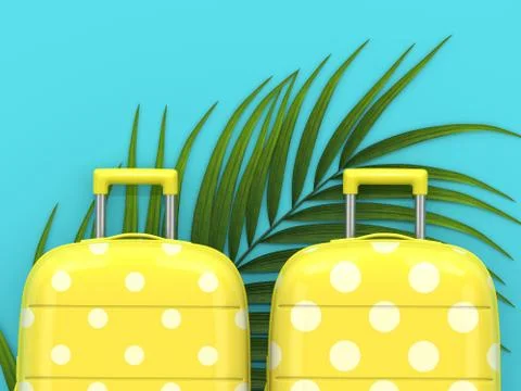 3d render of two suitcases lying on palm leaf Fotos de archivo