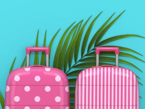 3d render of two suitcases lying on palm leaf Fotos de archivo