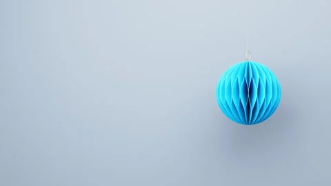 3D render of white Christmas blue paper ball on light grey background Stock Footage 293673882