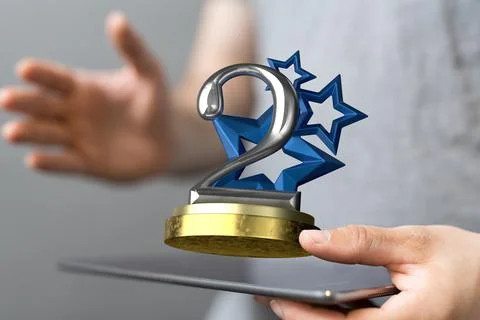 3D rendered 2nd place trophy with a real person in the background 스톡 사진