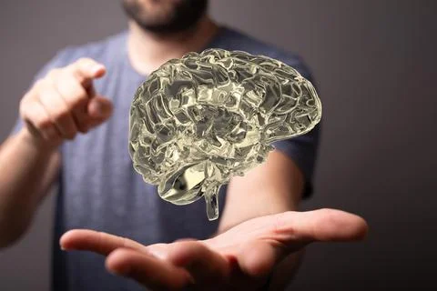 3D rendered Artificial Intelligence held in a person's hand Stock Photos