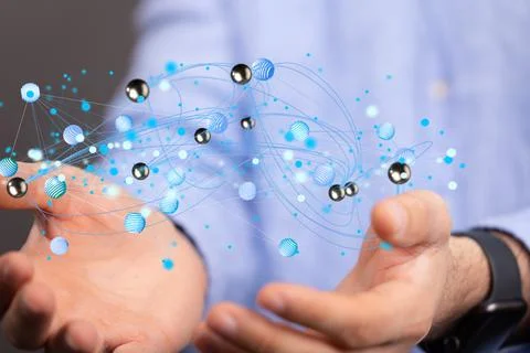 3D rendered data connected to each other held in a person's hand Stock Photos