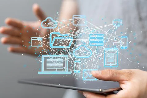 3D rendered devices and files connected to each other held in a person's hand Stock Photos