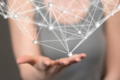 A 3D rendered futuristic globe with data connected to each other held in a pe Stock Photos