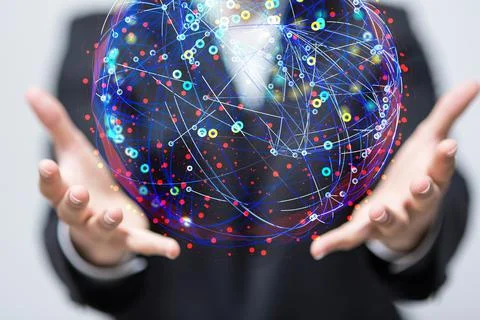 A 3D rendered futuristic globe with data connected to each other held in a pe 写真素材