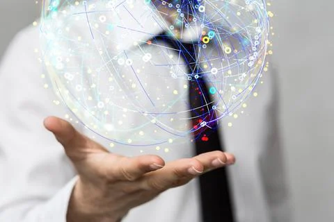 A 3D rendered futuristic globe with data connected to each other held in a pe Stock Photos