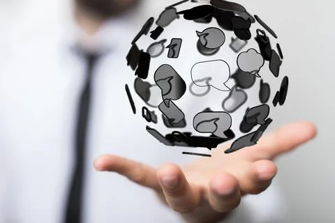 3D rendered globe with speech bubbles hovering over a man's hand Stockfoto's