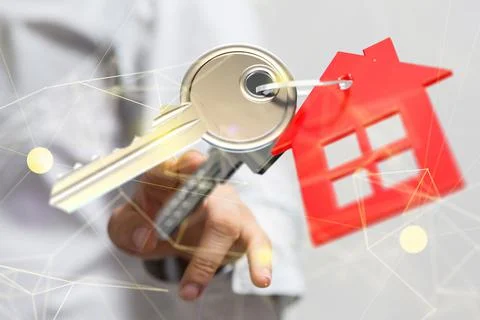 3D rendered house icon hovering in man's hand 写真素材
